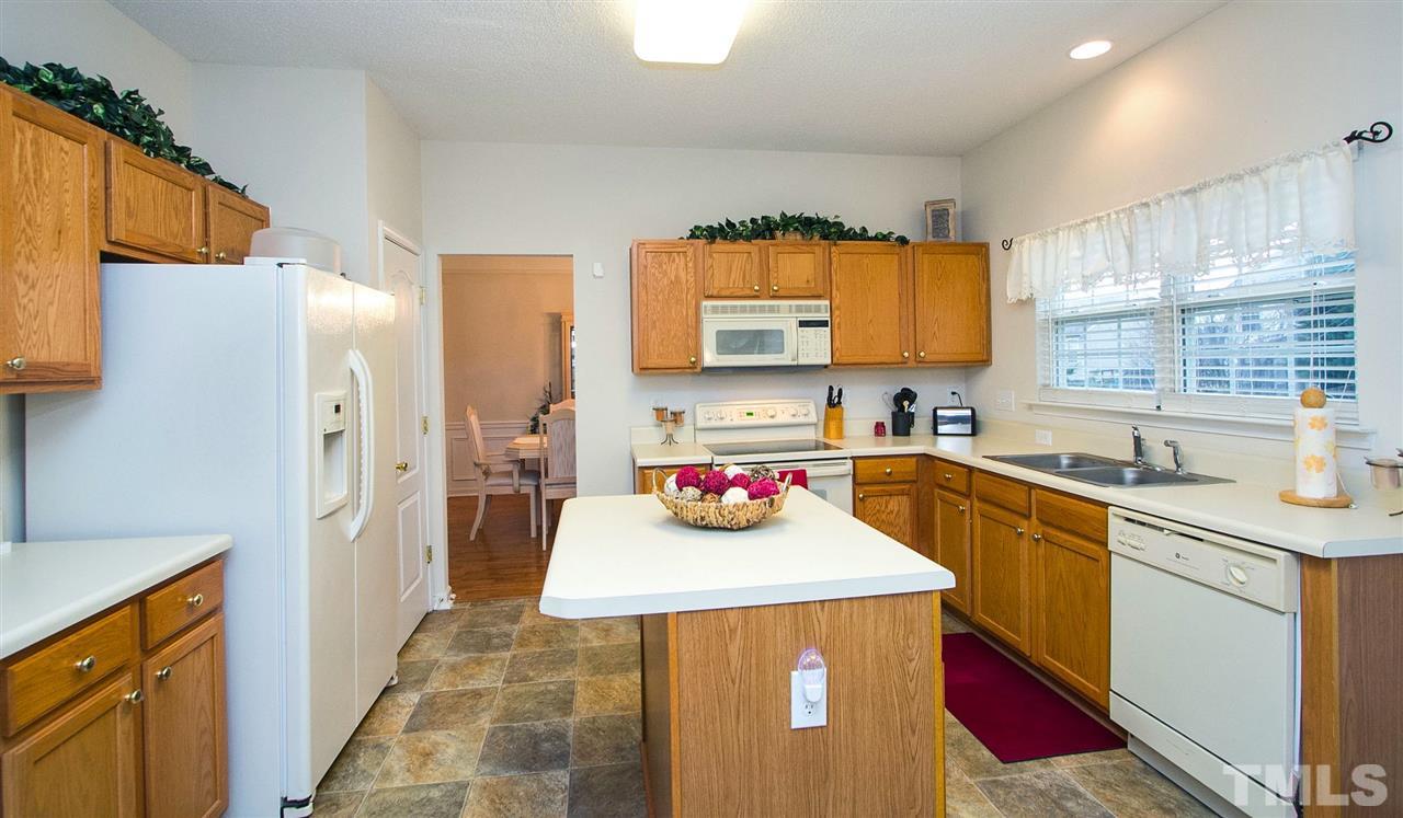 405 Grassy Point Road Apex, NC 27502 - Photo 8 of 25 Open, bright, lots of storage, pantry and tile flooring ....