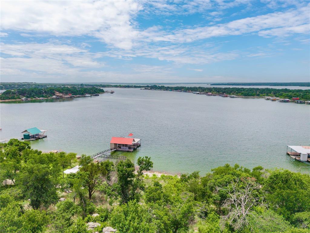 977 Deep Water Road May, TX 76857 - Photo 4 of 36 a yard with lake view