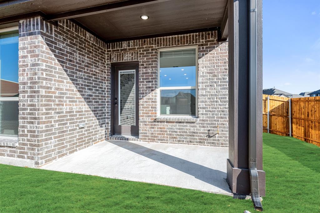 913 Firewood Way Anna, TX 75409 - Photo 36 of 40 a front view of a house with a garden