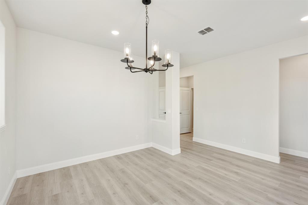 913 Firewood Way Anna, TX 75409 - Photo 7 of 40 a view of a chandelier in a room
