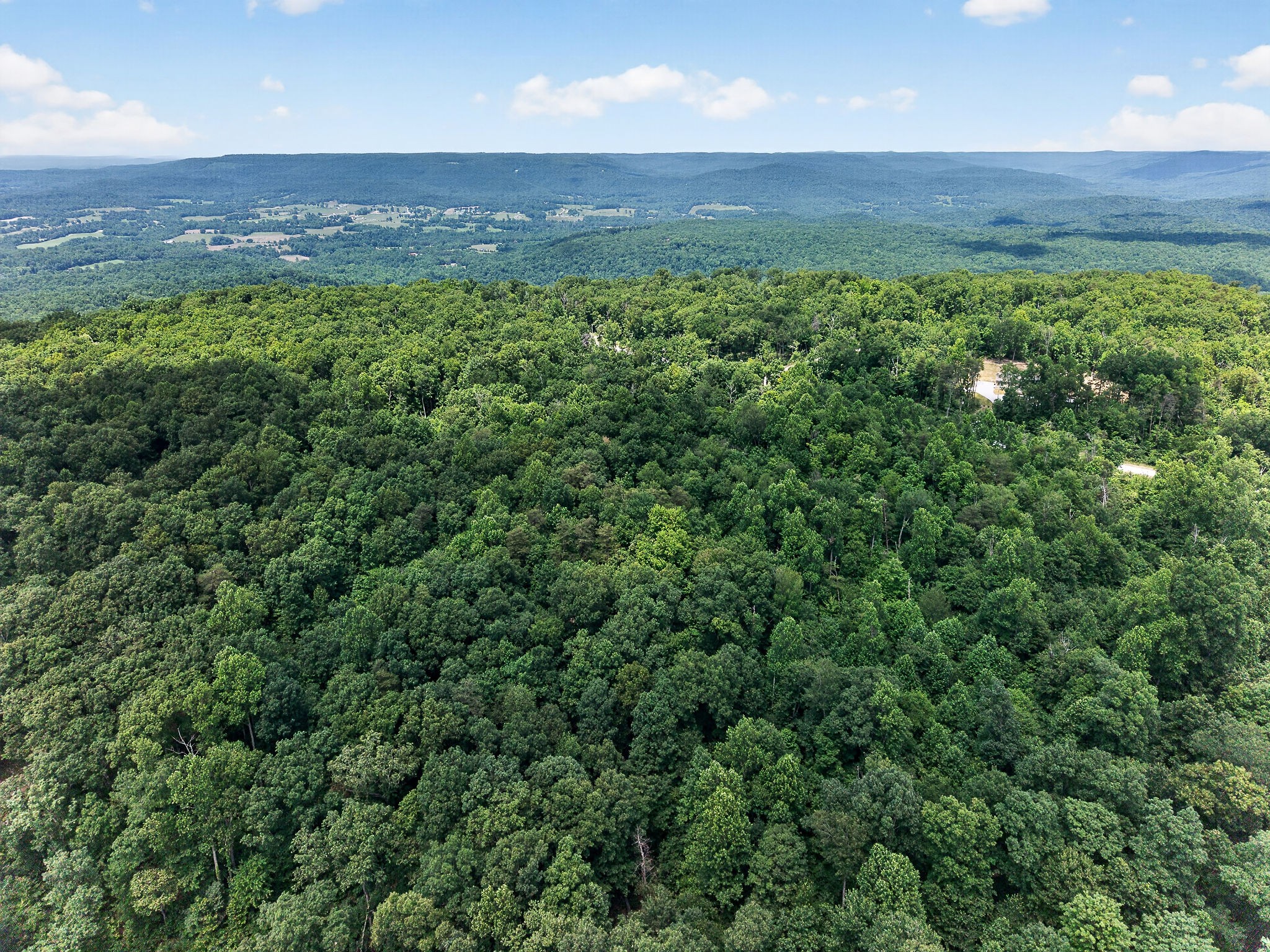 0 Coal Bank Road Sparta, TN 38583 - Photo 5 of 15 an aerial view of a house with a yard