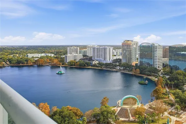 a view of a lake with a city