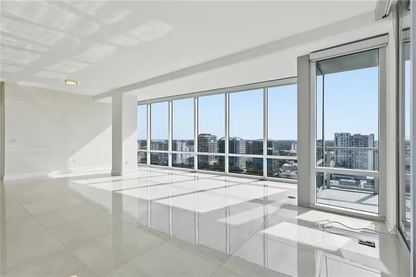 a room with view of kitchen and living room