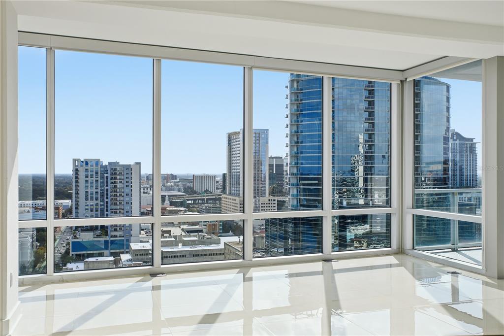 150 East Robinson Street, Unit 2002 Orlando, FL 32801 - Photo 12 of 41 a view of a balcony with a floor to ceiling windows and city view