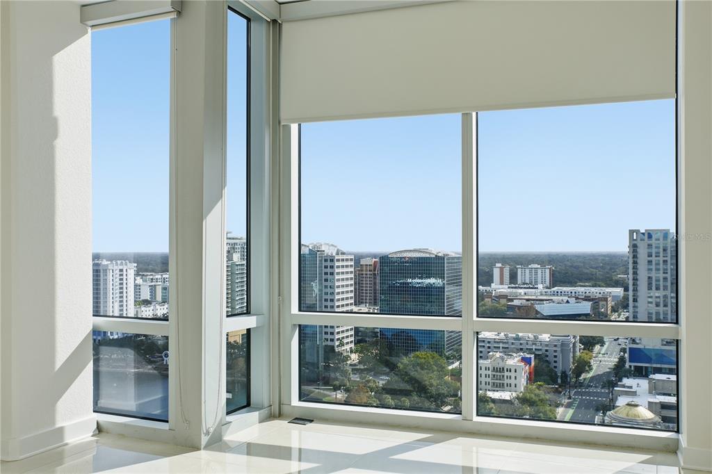 150 East Robinson Street, Unit 2002 Orlando, FL 32801 - Photo 16 of 41 a view of a city from a living room