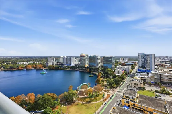 a view of a lake with a city
