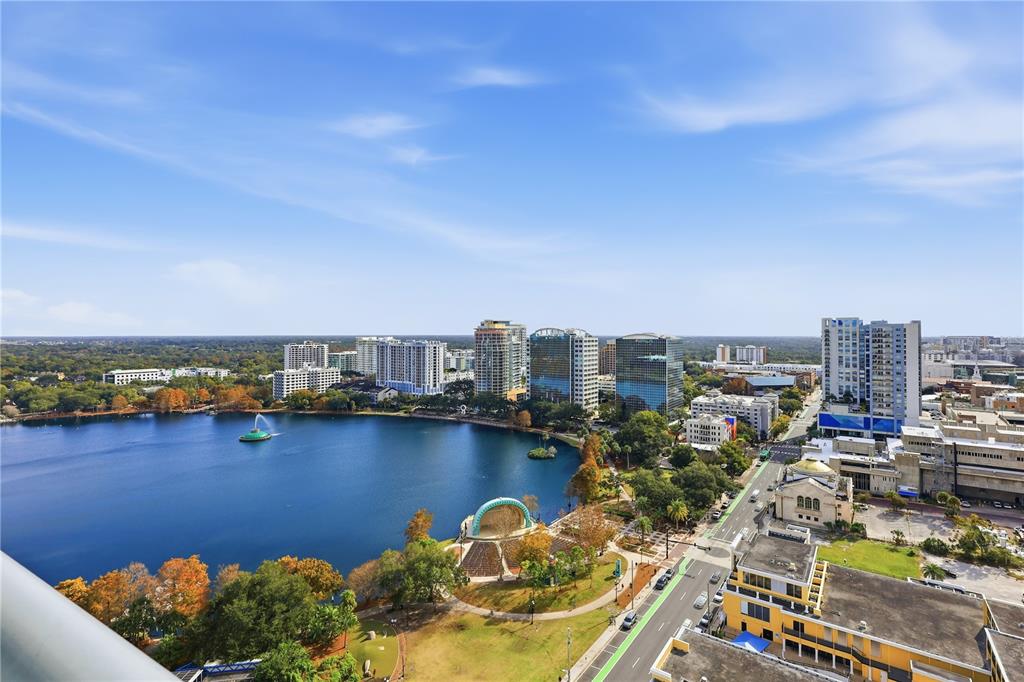 150 East Robinson Street, Unit 2002 Orlando, FL 32801 - Photo 2 of 41 a view of a lake with a city
