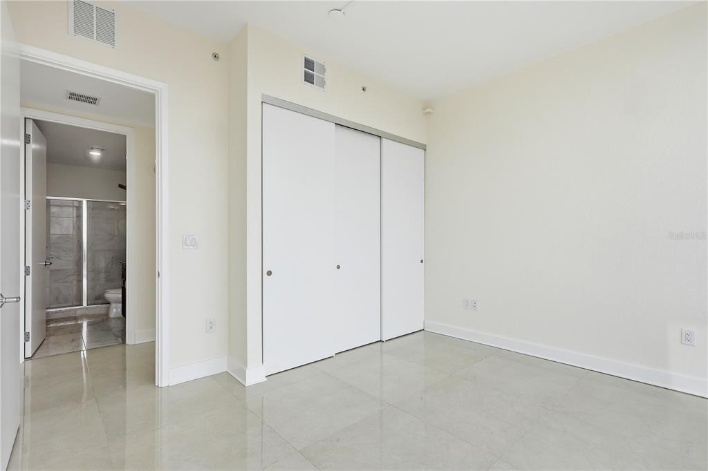150 East Robinson Street, Unit 2002 Orlando, FL 32801 - Photo 22 of 41 an empty room with closet