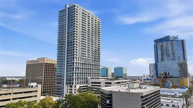 a view of a city with tall buildings