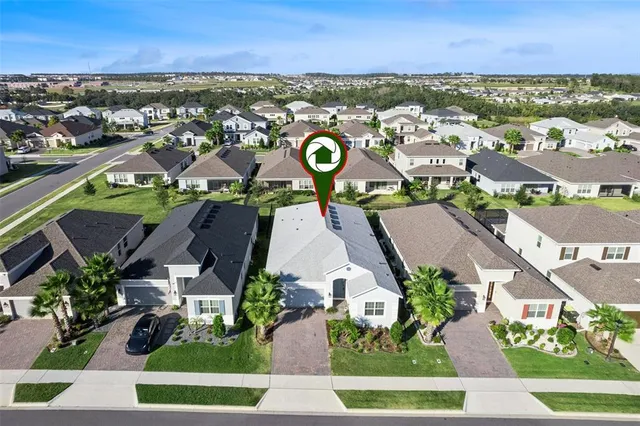 an aerial view of residential building with outdoor space