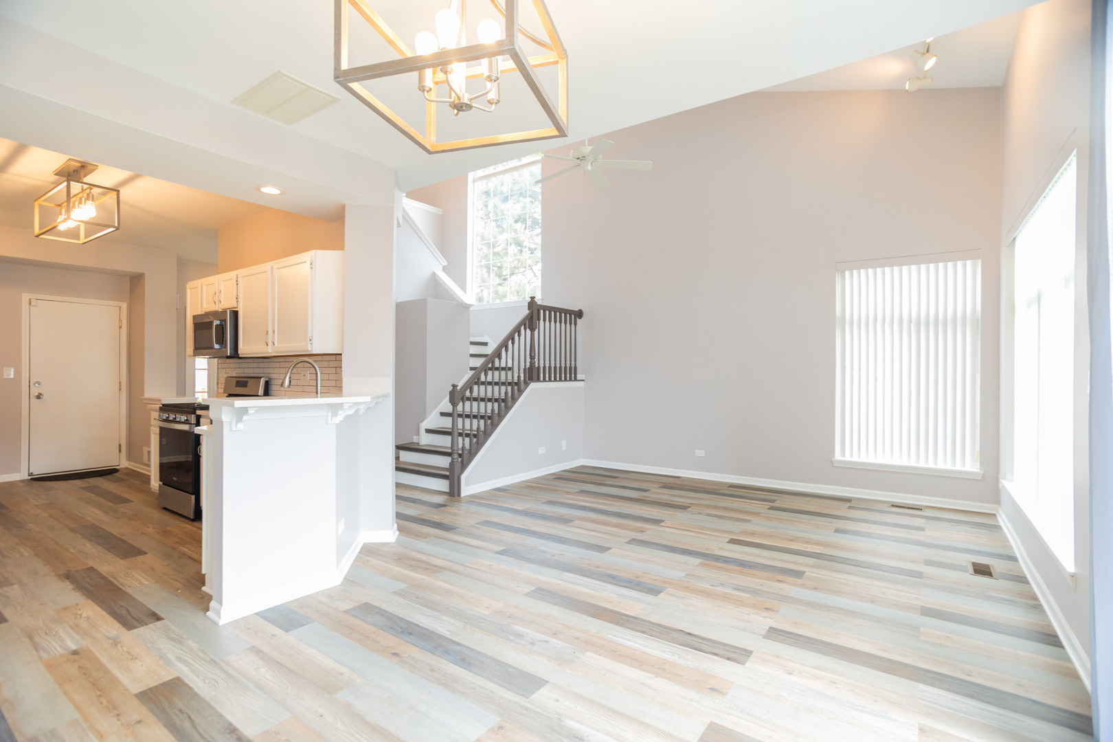 1082 Ripple Ridge Darien, IL 60561 - Photo 3 of 20 a view of a kitchen with furniture and wooden floor