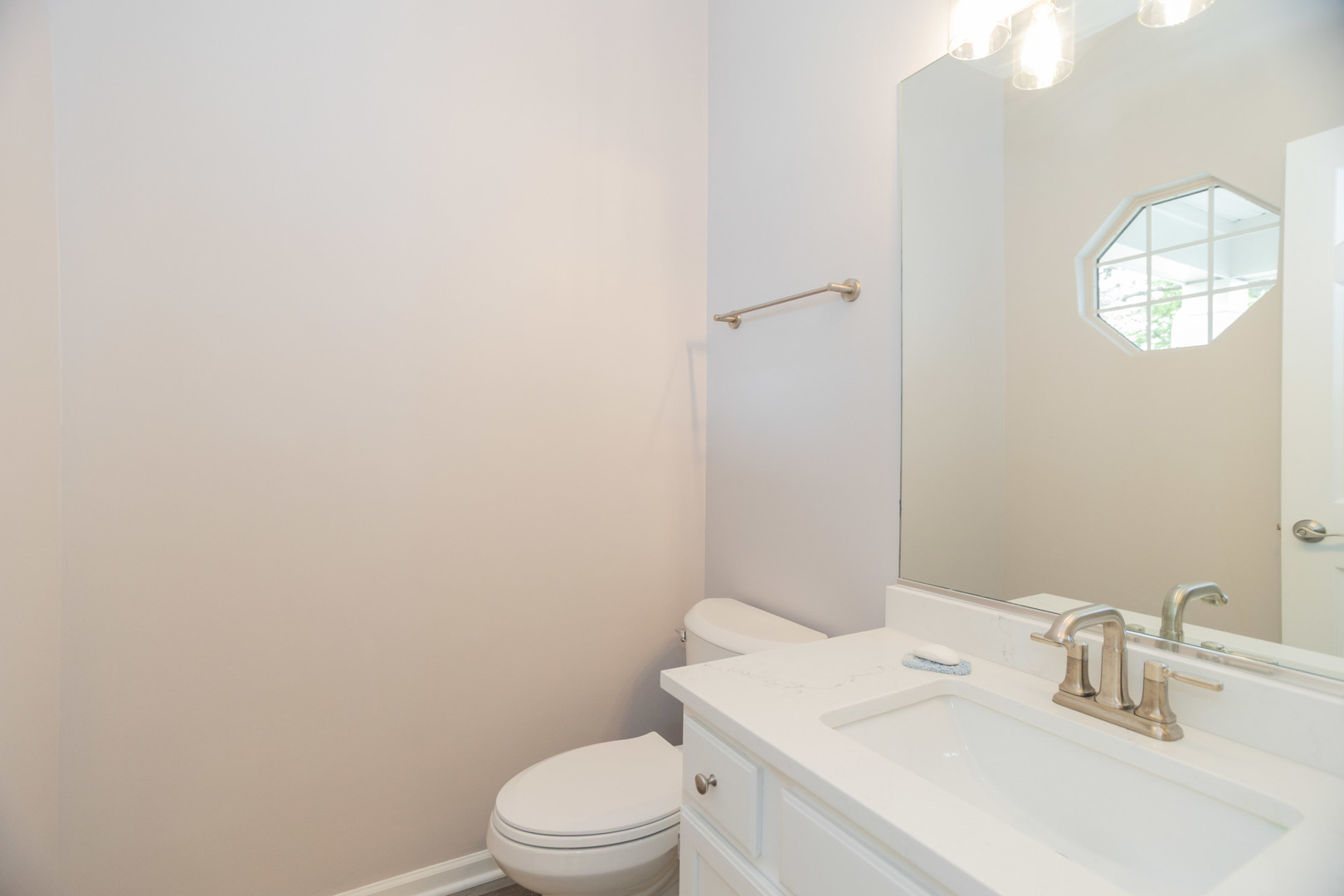 1082 Ripple Ridge Darien, IL 60561 - Photo 9 of 20 a bathroom with a sink a toilet and mirror