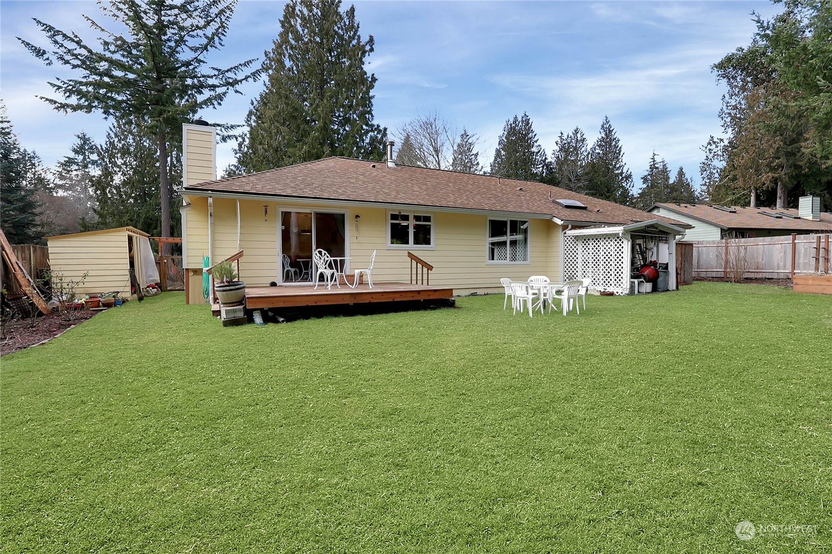 7455 Glacier Ridge Place Southeast Port Orchard, WA 98367 - Photo 24 of 32 a front view of a house with garden