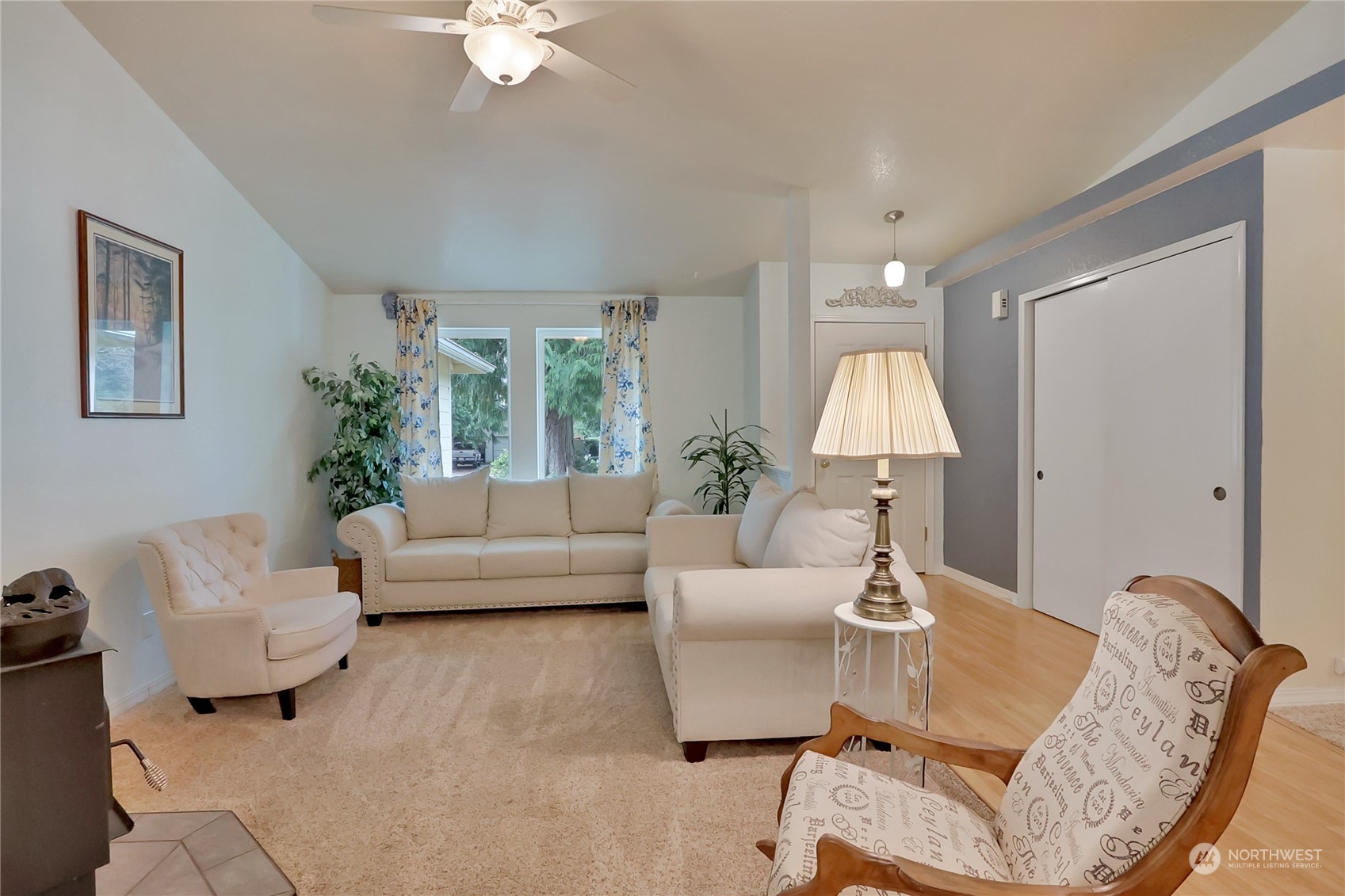 7455 Glacier Ridge Place Southeast Port Orchard, WA 98367 - Photo 7 of 32 a living room with furniture and a large window