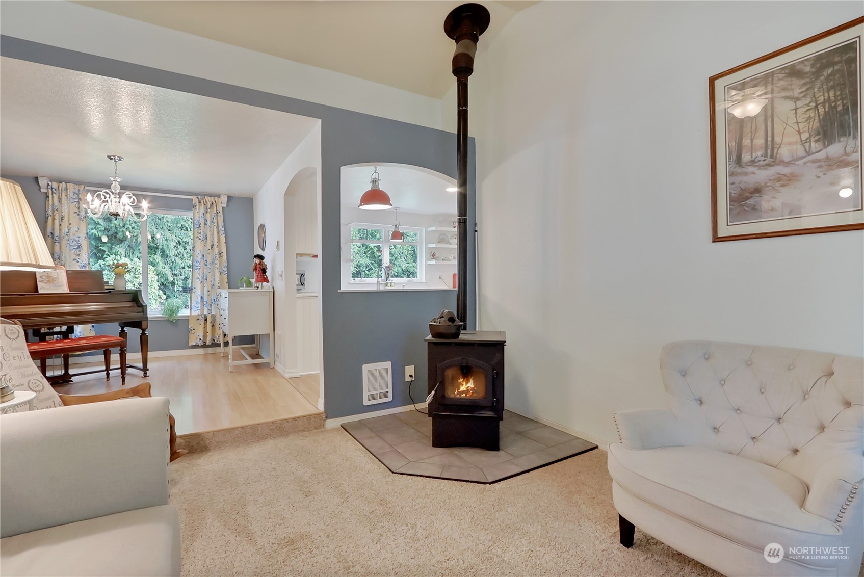 7455 Glacier Ridge Place Southeast Port Orchard, WA 98367 - Photo 8 of 32 a living room with furniture and a table
