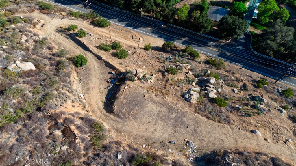 9504 Old Castle Road Valley Center, CA 92082 - Photo 13 of 16 a view of a yard with wooden fence