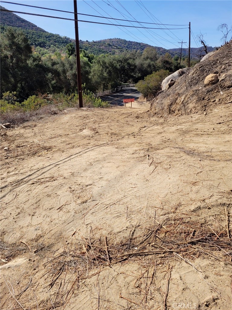 9504 Old Castle Road Valley Center, CA 92082 - Photo 9 of 16 a view of a backyard of a house
