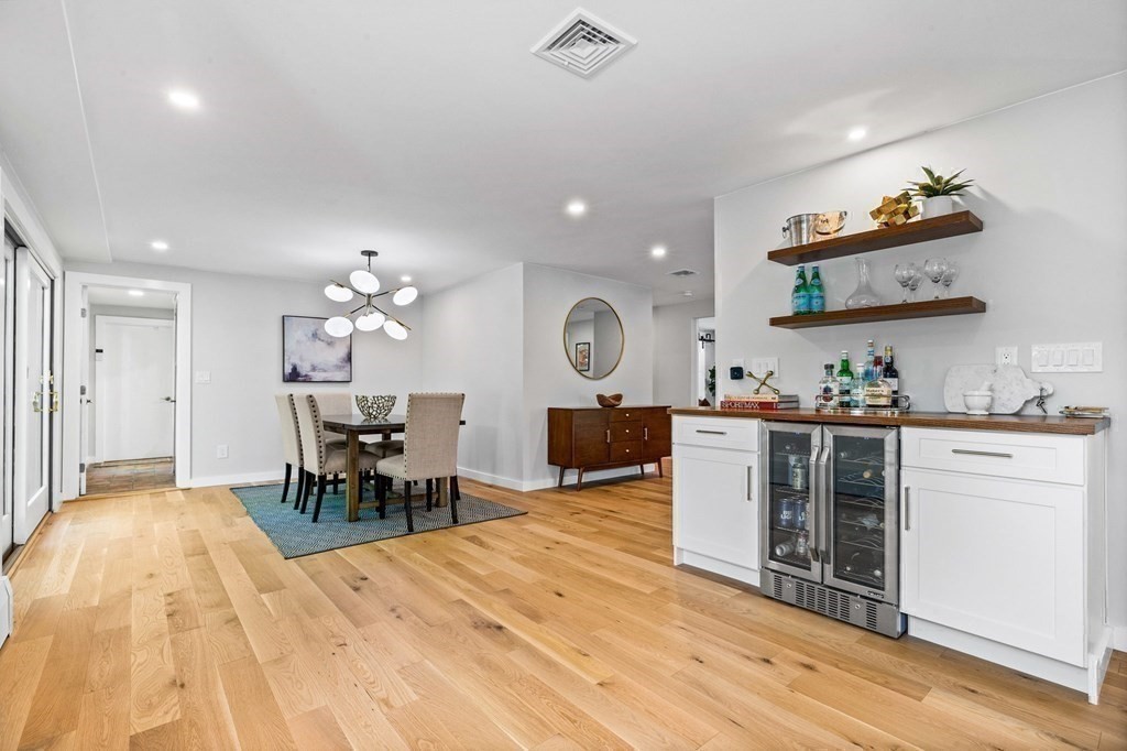 142 Ward Street Hingham, MA 02043 - Photo 12 of 41 a very nice looking room with kitchen furniture and a wooden floor