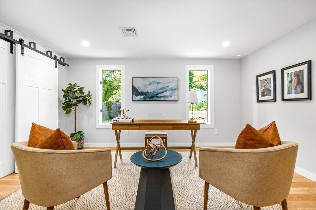 142 Ward Street Hingham, MA 02043 - Photo 15 of 41 a living room with furniture and a potted plant