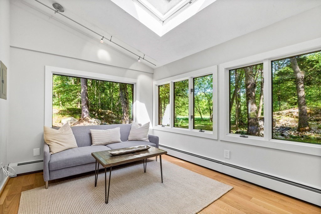 142 Ward Street Hingham, MA 02043 - Photo 17 of 41 a living room with furniture and a large window