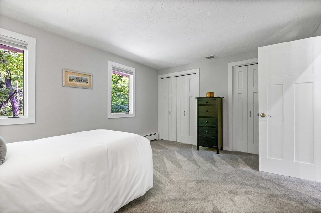 142 Ward Street Hingham, MA 02043 - Photo 21 of 41 a bedroom with a bed and a window