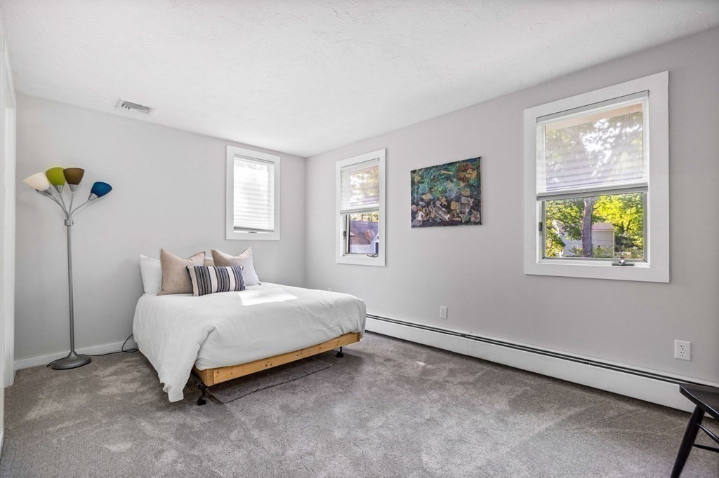 142 Ward Street Hingham, MA 02043 - Photo 23 of 41 a bedroom with a bed and a window
