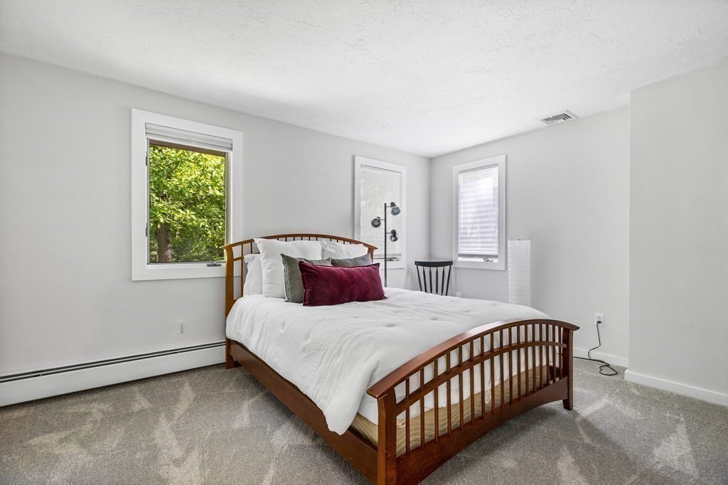 142 Ward Street Hingham, MA 02043 - Photo 24 of 41 a bedroom with a bed and a window
