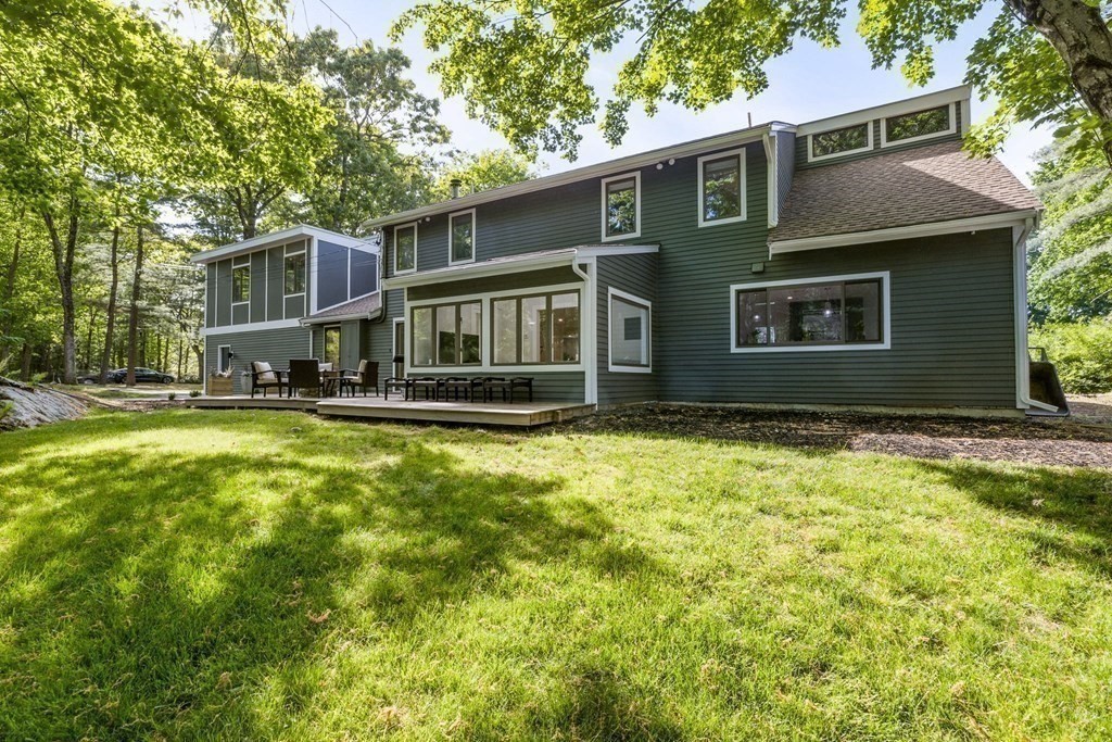 142 Ward Street Hingham, MA 02043 - Photo 32 of 41 a front view of a house with a yard