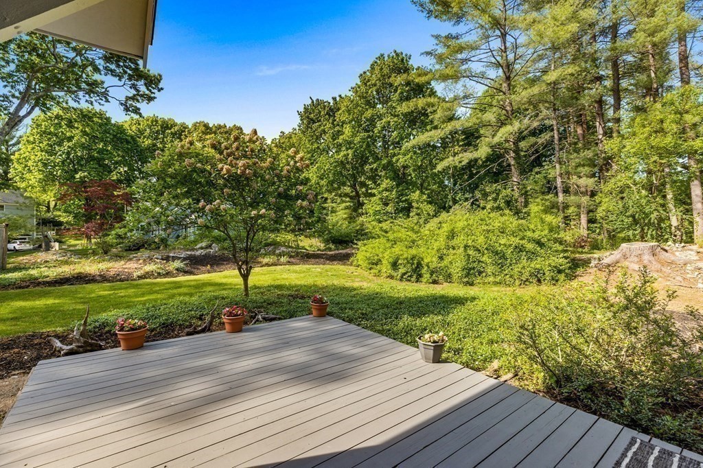 142 Ward Street Hingham, MA 02043 - Photo 36 of 41 a view of a deck and yard with green space
