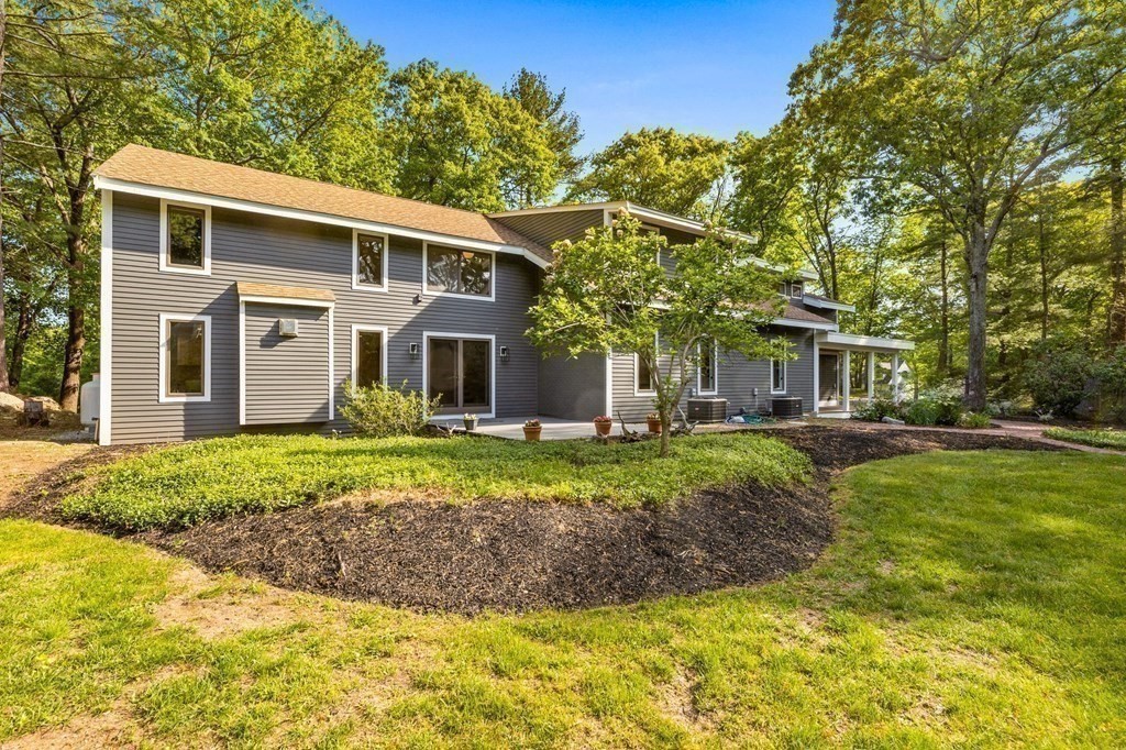 142 Ward Street Hingham, MA 02043 - Photo 40 of 41 a front view of a house with a yard