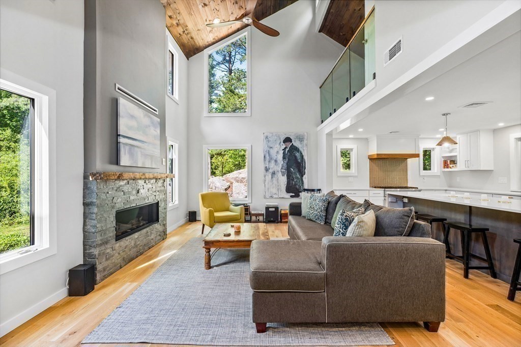 142 Ward Street Hingham, MA 02043 - Photo 6 of 41 a living room with furniture and a fireplace