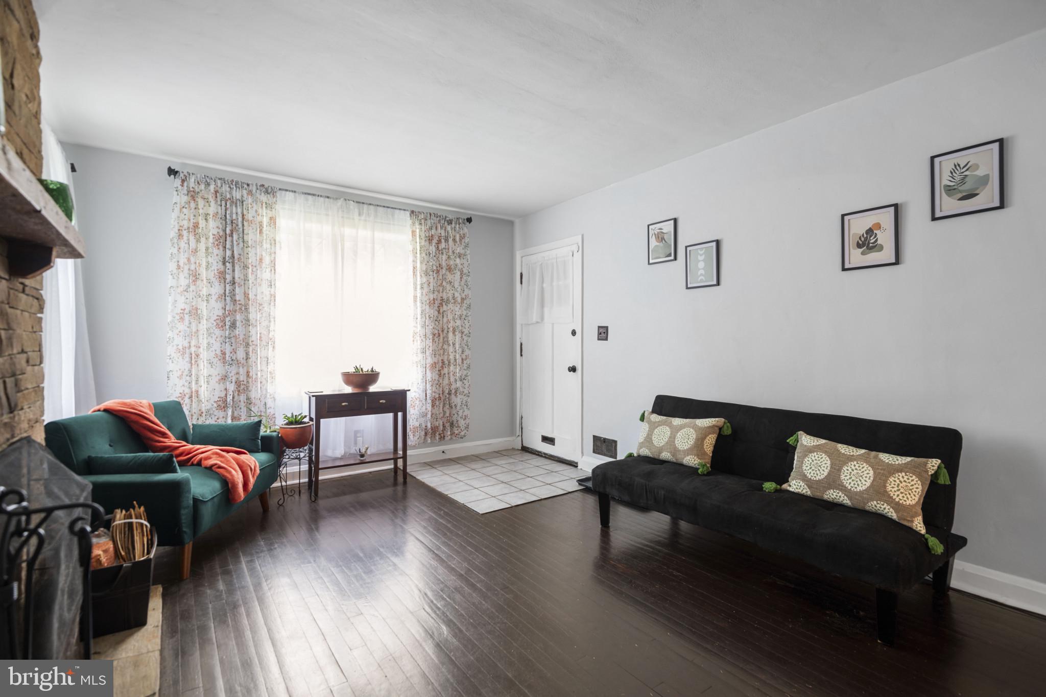 6402 Moyer Avenue Baltimore, MD 21206 - Photo 7 of 35 a living room with furniture and a wooden floor