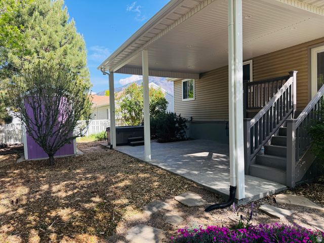 281 Winchester Drive Springville, UT 84663 - Photo 25 of 27 Covered patio featuring a concrete surface and a hot tub