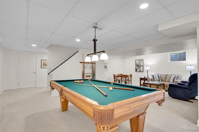 a view of a backyard with sitting area