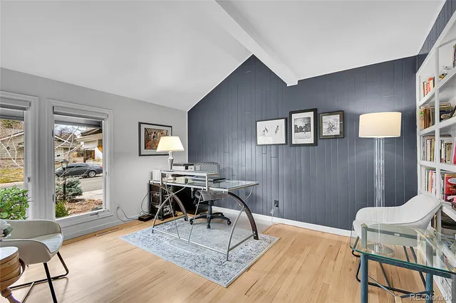 a view of a livingroom with furniture and wooden floor