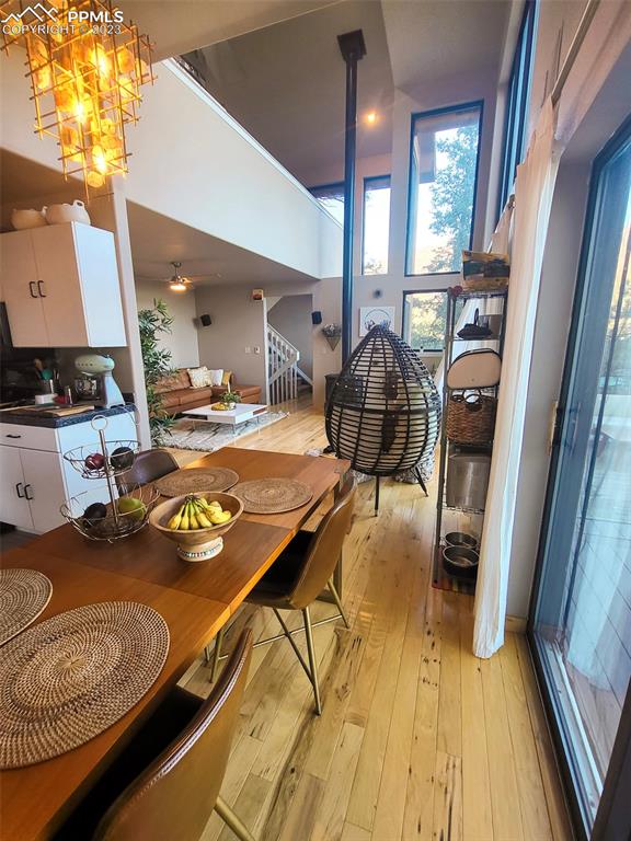 4440 Prairie Street Cascade, CO 80809 - Photo 12 of 31 a living room with furniture and wooden floor