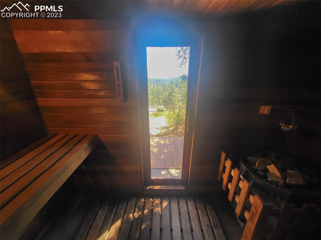 4440 Prairie Street Cascade, CO 80809 - Photo 7 of 31 a view of wooden floor