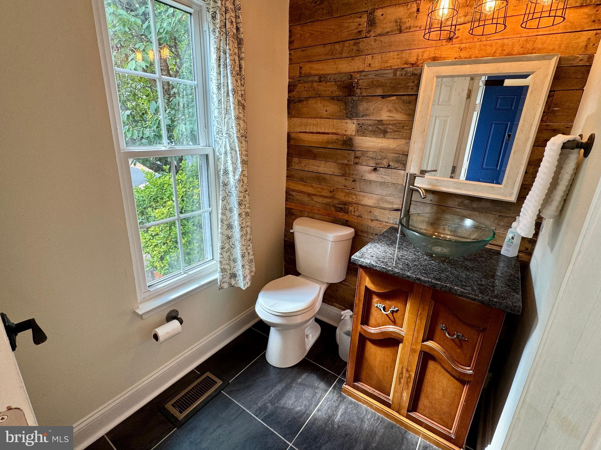 903 Wind Ridge Drive Stafford, VA 22554 - Photo 15 of 34 a bathroom with a toilet sink and mirror