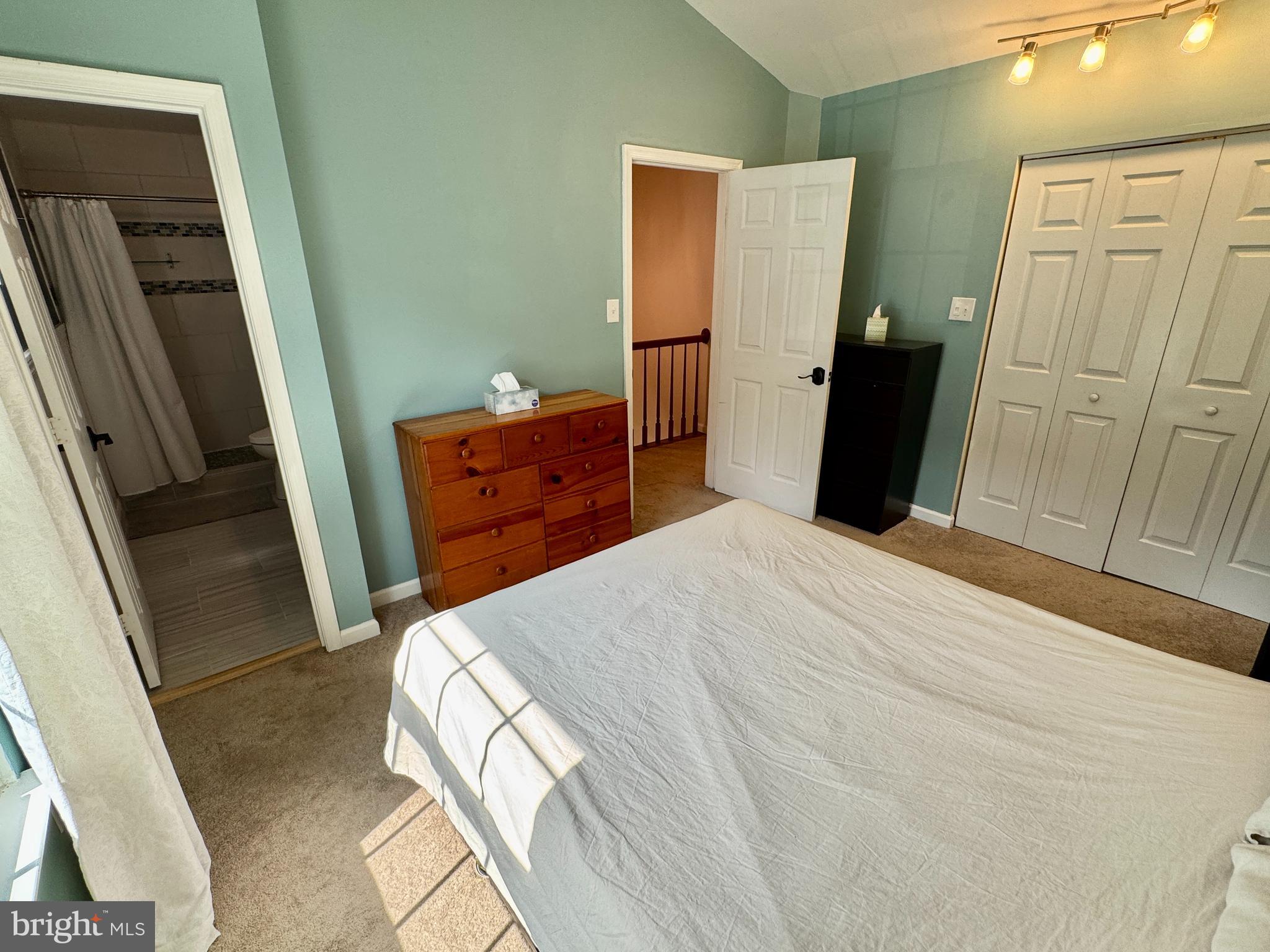 903 Wind Ridge Drive Stafford, VA 22554 - Photo 16 of 34 a bedroom with a bed and wooden floor