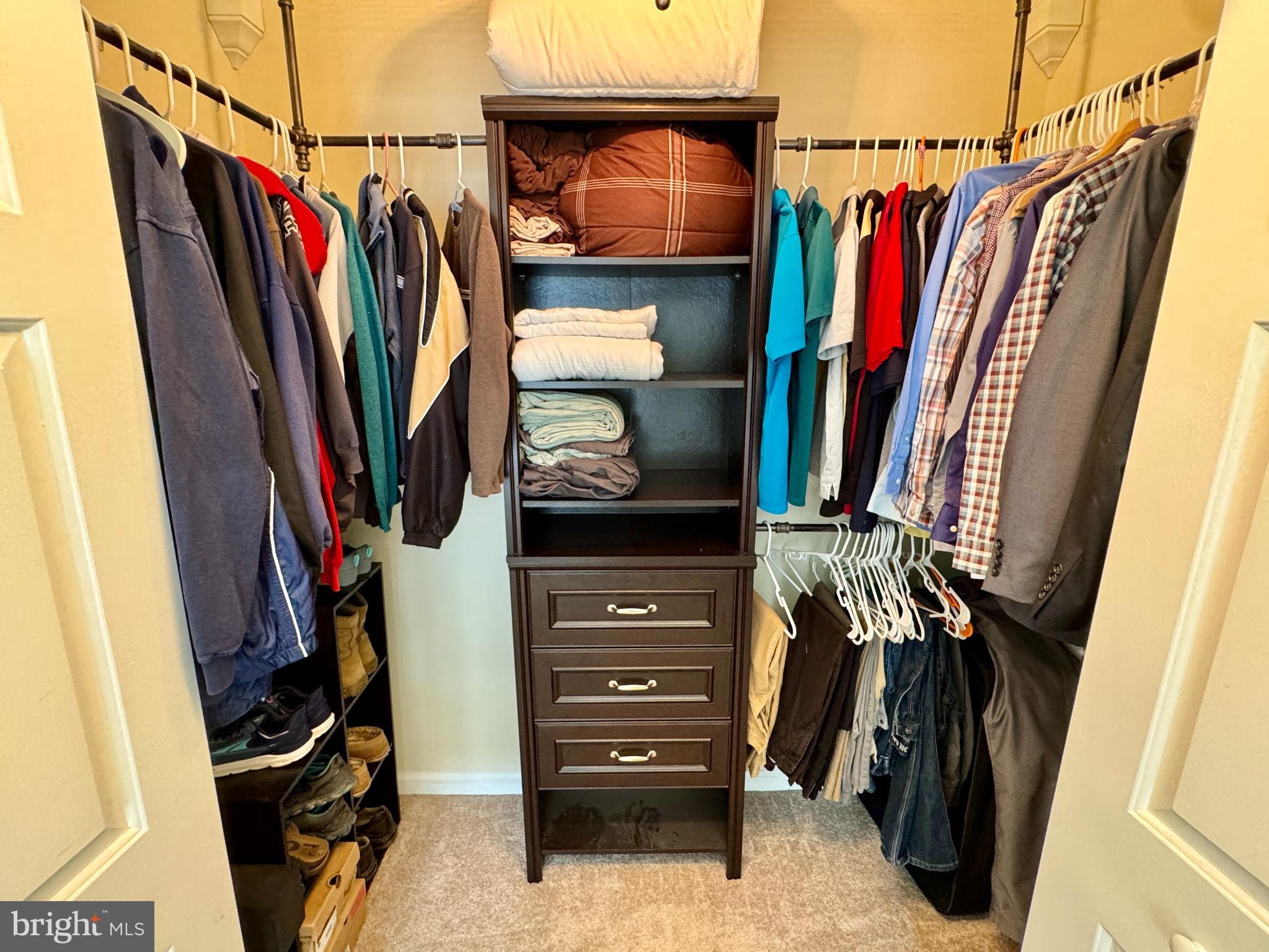 903 Wind Ridge Drive Stafford, VA 22554 - Photo 19 of 34 a view of walk in closet with clothes