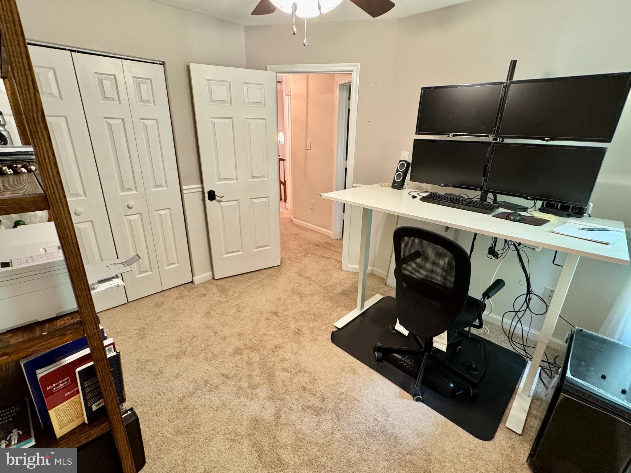 903 Wind Ridge Drive Stafford, VA 22554 - Photo 20 of 34 a living room with furniture and a flat screen tv