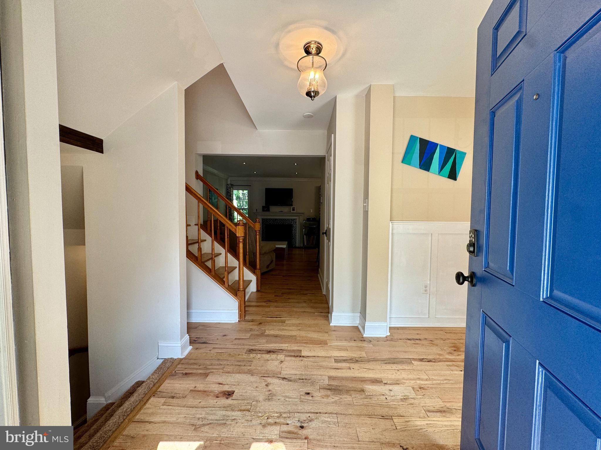 903 Wind Ridge Drive Stafford, VA 22554 - Photo 2 of 34 a view of a livingroom with wooden floor and stairs
