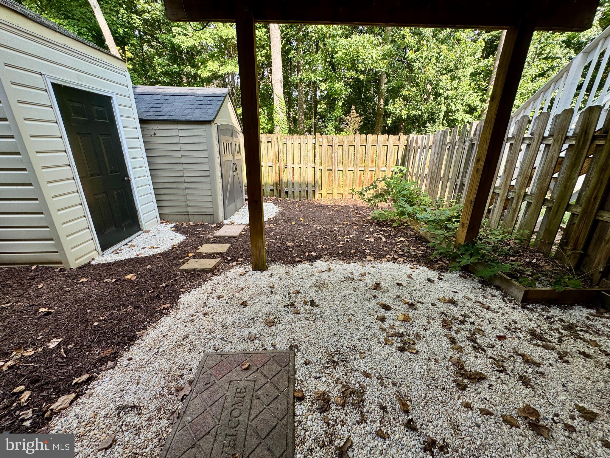 903 Wind Ridge Drive Stafford, VA 22554 - Photo 31 of 34 a view of a backyard with a large tree