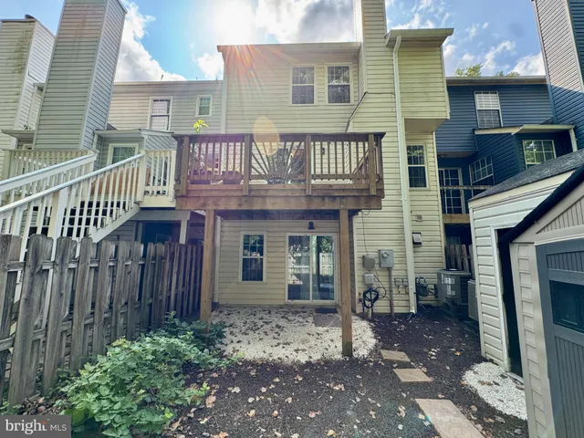 a view of balcony with wooden floor