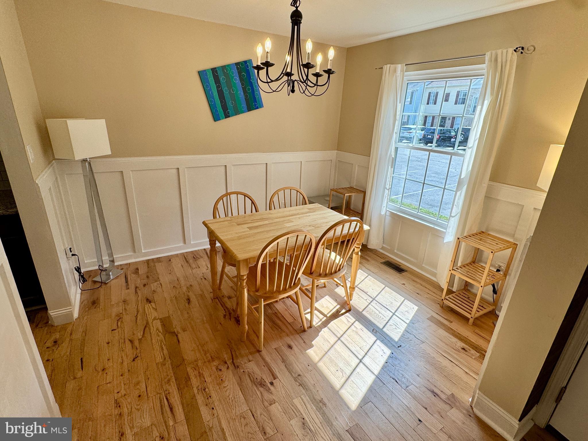 903 Wind Ridge Drive Stafford, VA 22554 - Photo 4 of 34 a bedroom with a bed and a flat tv screen on the dresser
