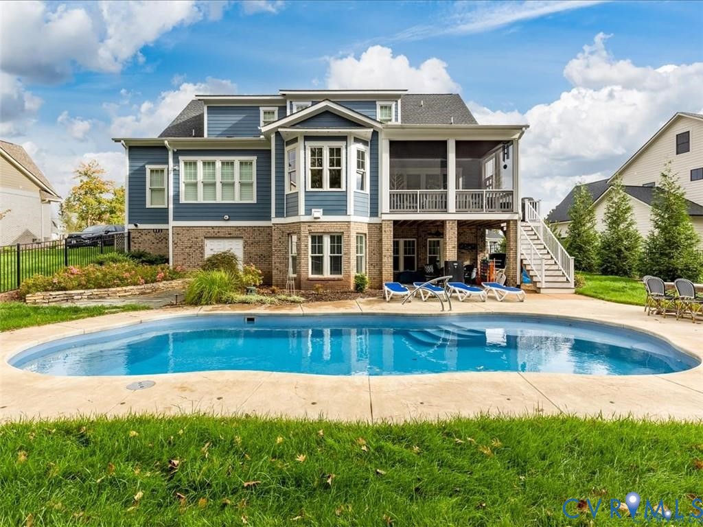 16125 Binley Road Midlothian, VA 23112 - Photo 1 of 50 a view of a house with swimming pool