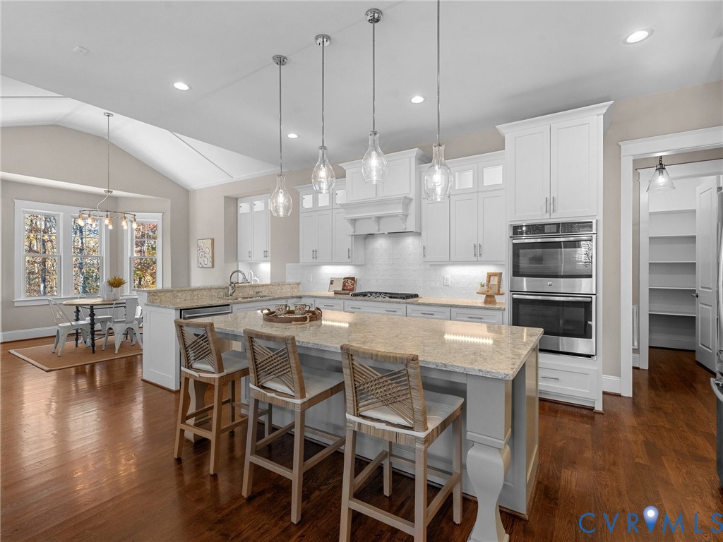 16125 Binley Road Midlothian, VA 23112 - Photo 20 of 50 a large kitchen with a table and chairs