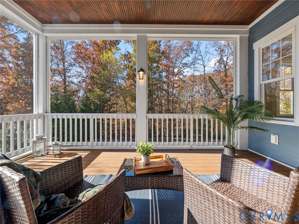 16125 Binley Road Midlothian, VA 23112 - Photo 24 of 50 a balcony with wooden floor and outdoor seating