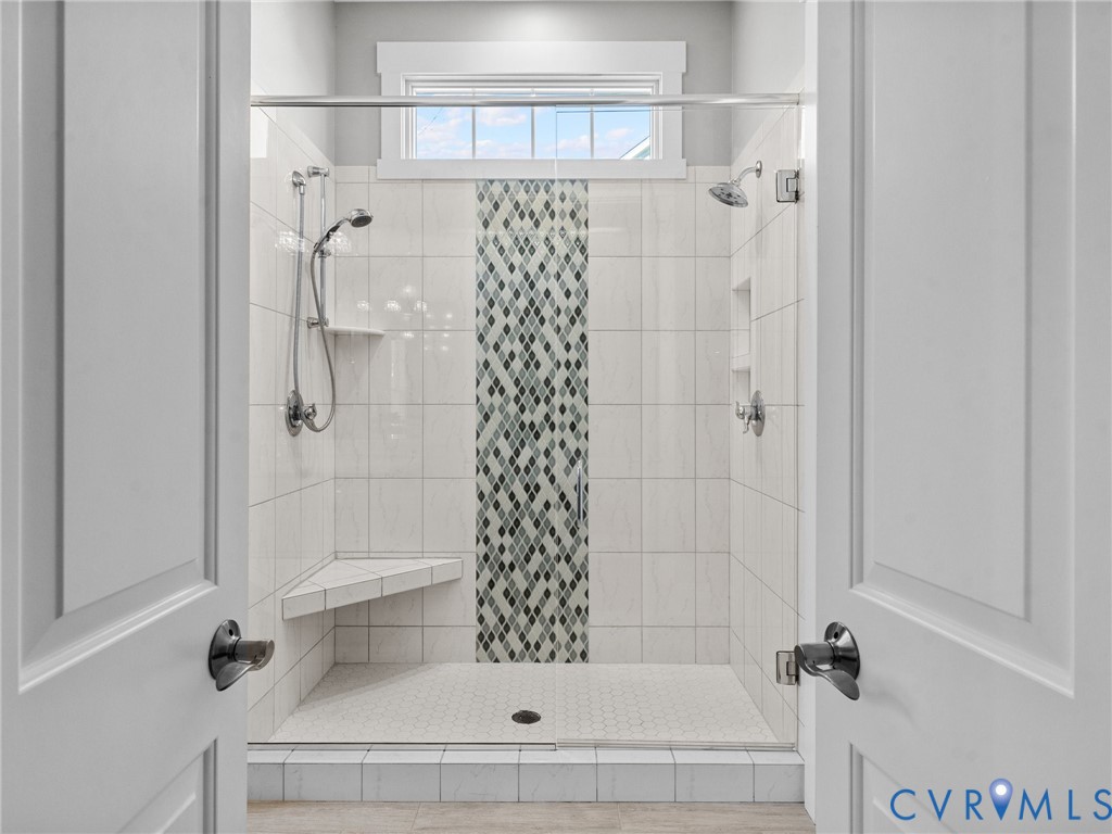 16125 Binley Road Midlothian, VA 23112 - Photo 27 of 50 a bathroom with a bathtub and shower