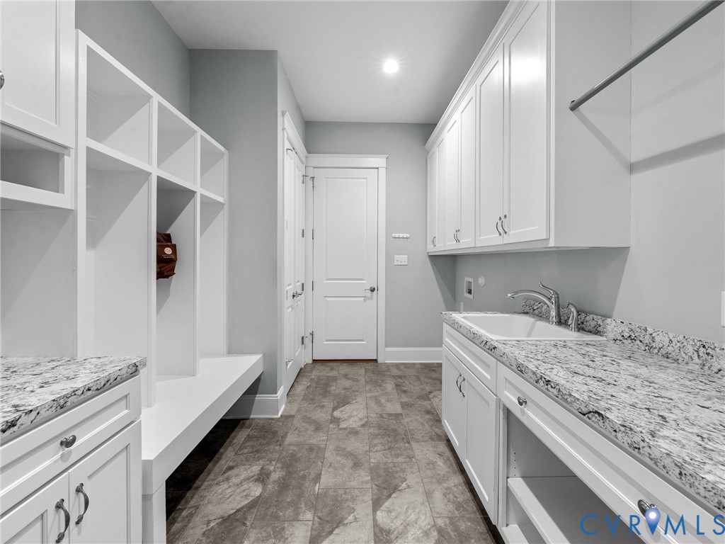 16125 Binley Road Midlothian, VA 23112 - Photo 31 of 50 a spacious bathroom with a granite countertop sink a toilet and shower